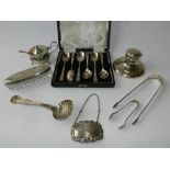 A silver decanter label engraved 'whiskey' together with a cased set of six silver spoons,