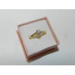 An 18ct gold single stone diamond ring,