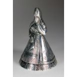 A continental white metal bell, in the form of a woman, the interior stamped '925', 9cm high,