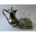 A collection of silver plated wares to include an entree dish and cover, a toast rack,