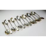 A matched set of thirteen Victorian Fiddle pattern Newcastle silver spoons, Reid & Sons,