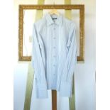 A Gucci shirt, white with black stripe,