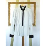 A Gucci shirt, white with black stripe,