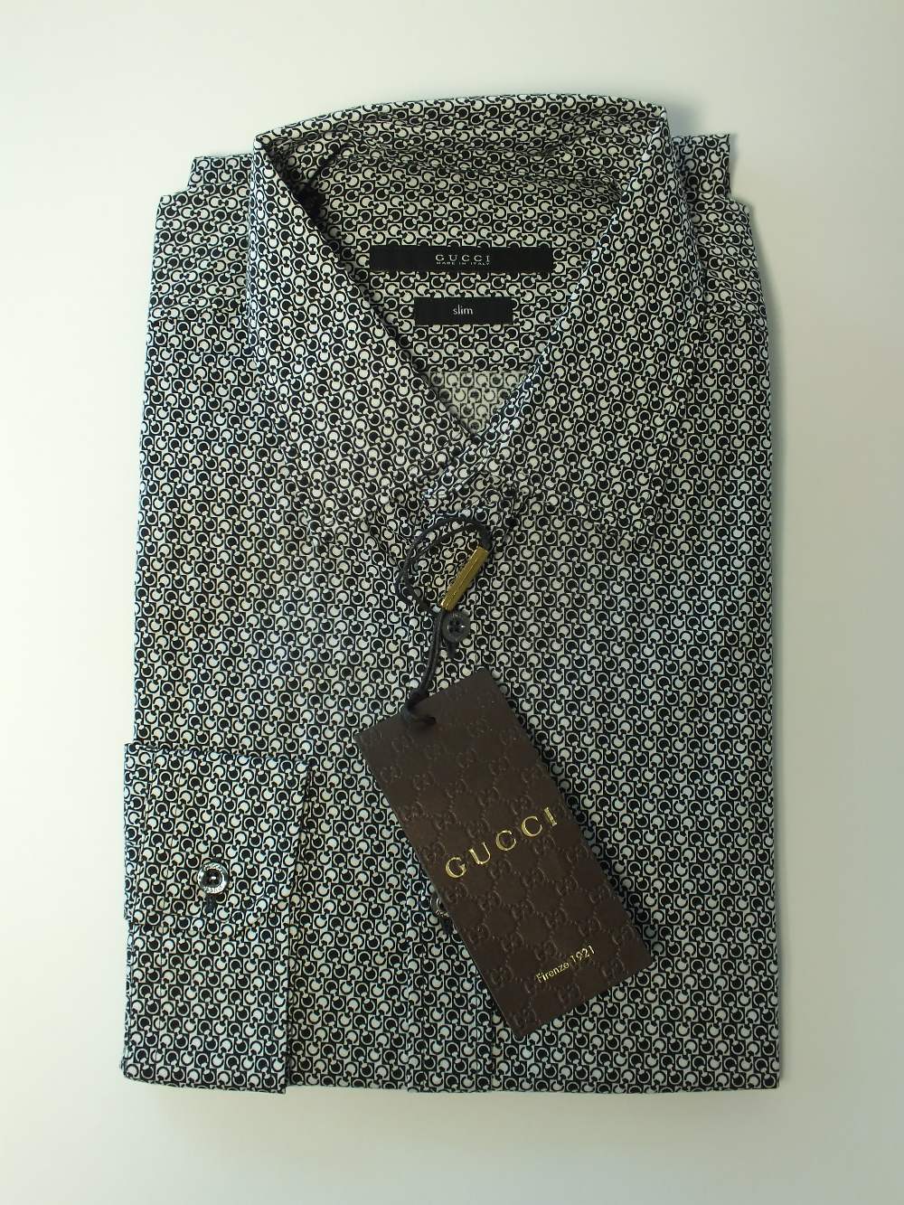 A Gucci shirt, black and white pattern,