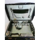 A cased travelling silver mounted vanity set, London and Birmingham,