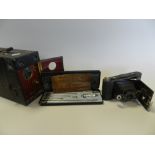 Two trays of cameras and precision instruments to include an Ensign Patent box camera,