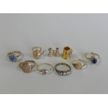 Three 9ct gold charms comprising a kettle,