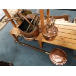 A quantity of metal wares and works of art to include a brass jam skillet, a set of fire tools,