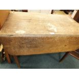 A 19th century oak drop-leaf Pembroke table with single end drawer