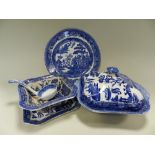 A quantity of blue printed Willow pattern table wares mainly Wedgwood & Co Ltd,