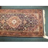 An Indo Persian wool pile runner,