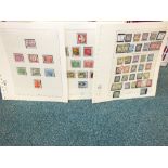 A large collection of British commonwealth and other stamps including loose album pages,