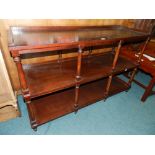 A stained oak three tier open buffet, each shelf spaced by pilasters 141cm wide, 51cm deep,