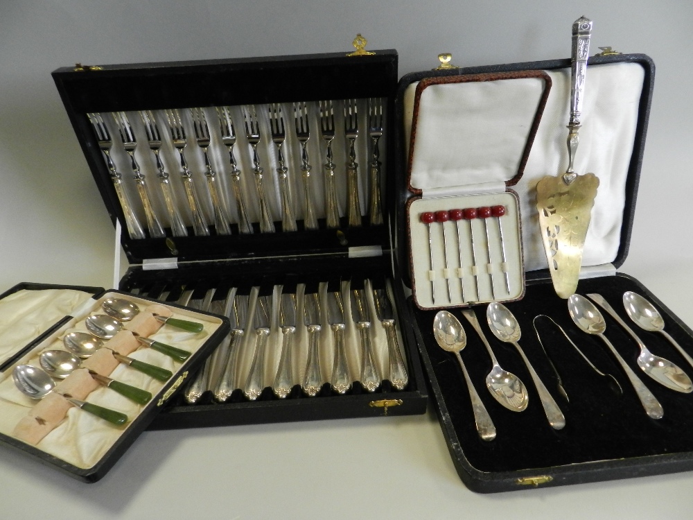 A cased set of silver handled fruit knives and forks together with a cased set of six silver
