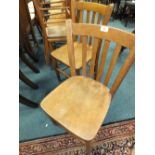 A set of six elm seat slat back kitchen chairs