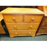 A pine chest of two short and two long drawers on bracket feet, 98cm wide, 47cm deep,