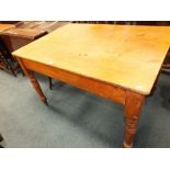 An early 20th century scrub top pine kitchen table with single end frieze drawer, 115cm long,