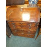 An early 18th century oak bureau with fitted interior above four long drawers on later bun feet,