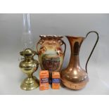 A copper jug, a copper ewer,