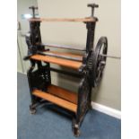 A painted cast iron mangle by Astons,