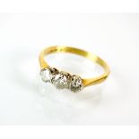 A three stone graduated diamond ring,