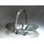 A Victorian swing handled silver cake basket, Hawksworth, Eyre & Co, Sheffield 1854,