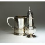 A silver mug, Mappin & Webb, London 1928, of plain polished circular form with band to waist, 11.