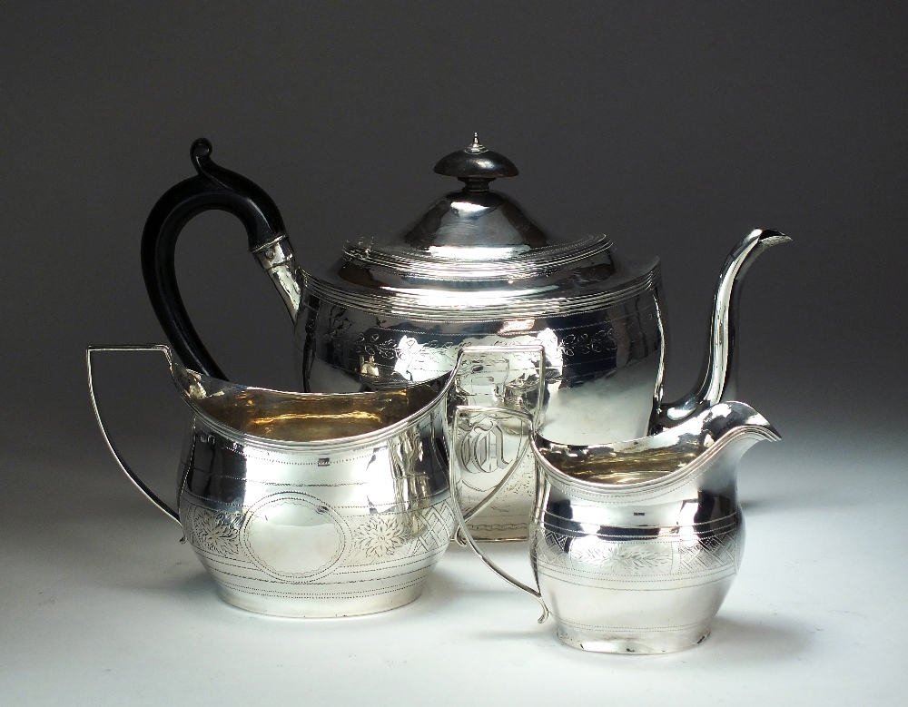 A matched three piece silver tea service, comprising; a teapot, George Burrows I, London 1801, 16.