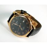 A Gentleman's gold plated Tissot Le Locle automatic wristwatch, the black dial with Roman numerals,