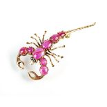 A ruby and sapphire scorpion brooch, designed as a cabochon ruby set 'body',