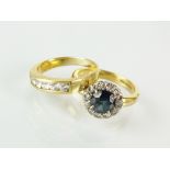 An 18ct gold sapphire and diamond cluster ring, size K,