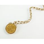 A 1911 half sovereign within pendant mount, suspended from 9ct gold chain, total weight 7.