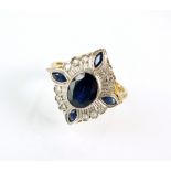 A 9ct yellow and white gold sapphire and diamond cluster ring,