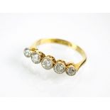 An early 20th century graduated five stone diamond ring,