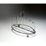 A George III silver six division toast rack, W*, London 1795,