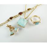 A suite of Larimar and amber jewellery, comprising; a pendant on yellow metal chain, stamped '375',