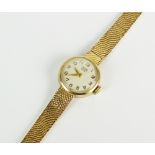 A Lady's 9ct gold Tudor Royal bracelet watch, the circular white dial with Arabic numerals,