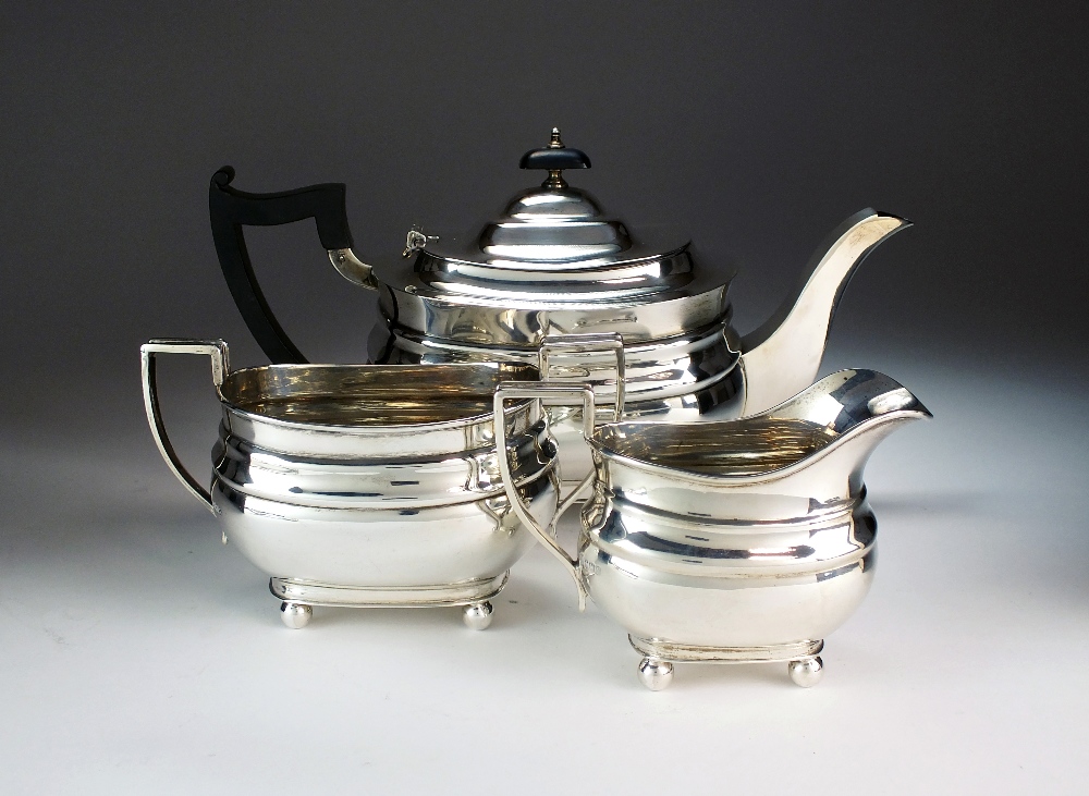 A three piece silver tea service, William Hutton & Sons Ltd, Sheffield 1940 & 41,