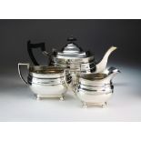 A three piece silver tea service, William Hutton & Sons Ltd, Sheffield 1940 & 41,