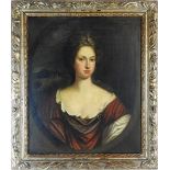 Manner of Godfrey Kneller (1646-1723) Portrait of a lady, half length in a painted oval,