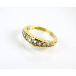 A graduated nine stone diamond ring,