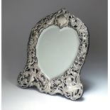 A Victorian silver mounted mirror, William Comyns & Sons, London 1900,