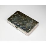 A Georg Jensen silver cigarette case, of rectangular form with engraved decoration,