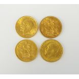 Four George V sovereigns, dated 1912, 1913, 1925 and 1926,