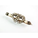 A late 19th century diamond and pearl bar brooch,