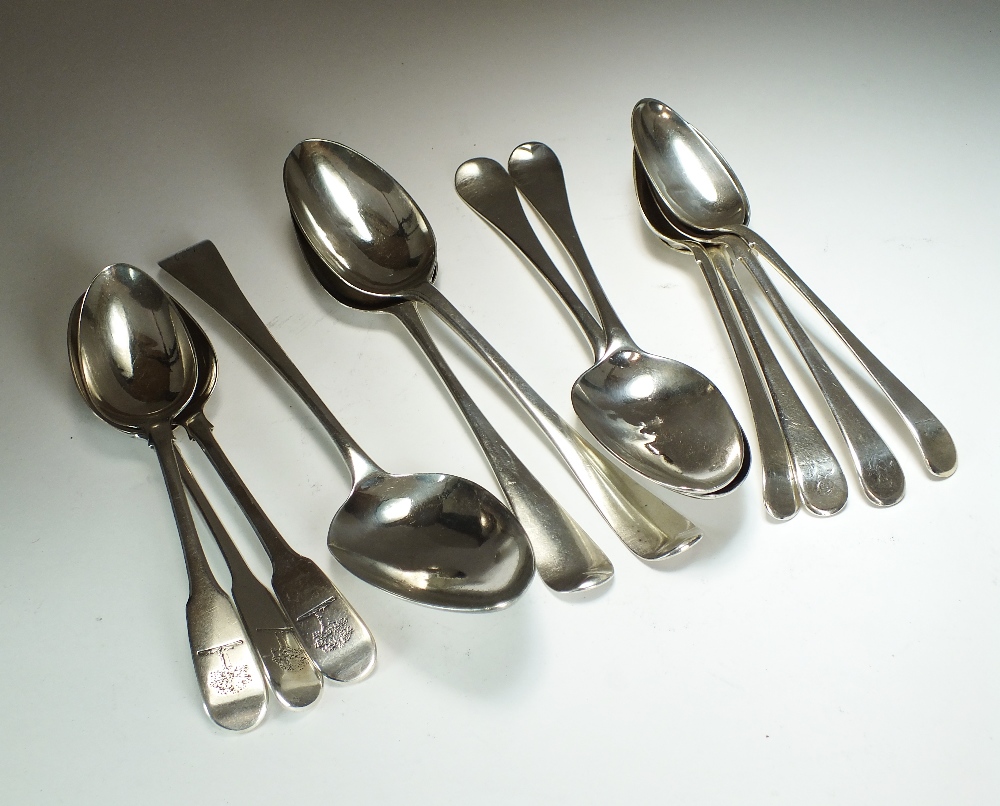 A set four George III silver dessert spoons, W**, London 1762,