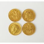 Four George V sovereigns,