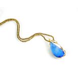 A boulder opal and diamond pendant,