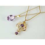 An early 20th century amethyst set openwork pendant, stamped to the reverse '9ct',