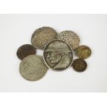 An assorted collection of British and Foreign coins, comprising; two Victoria halfpennies,